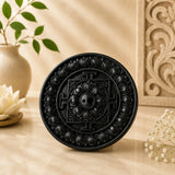 Leela round black clay incense holder with an intricately carved lotus mandala design and central incense openings