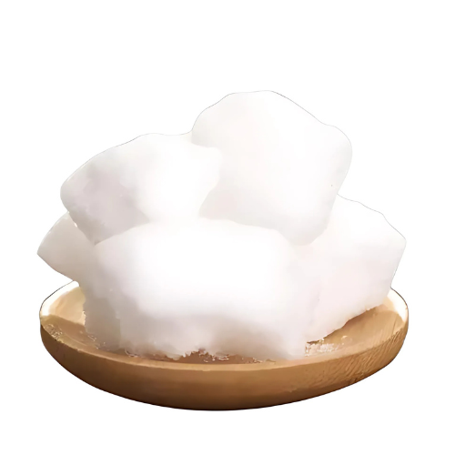 Leela Cotton Camphor pieces arranged on a shallow dish against a white background