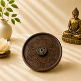 Leela round dark brown wooden incense holder with a hand-carved lotus design and central brass-lined opening