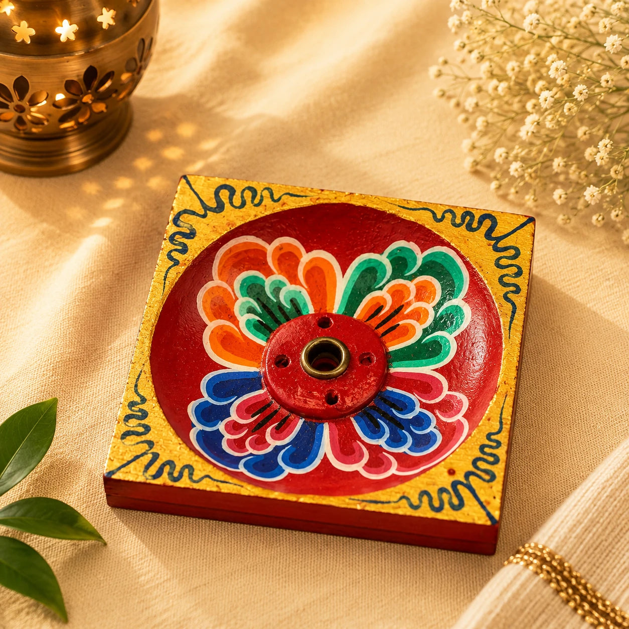 Leela Hand-Painted Square Wooden Incense Holder with a traditional floral design for incense sticks