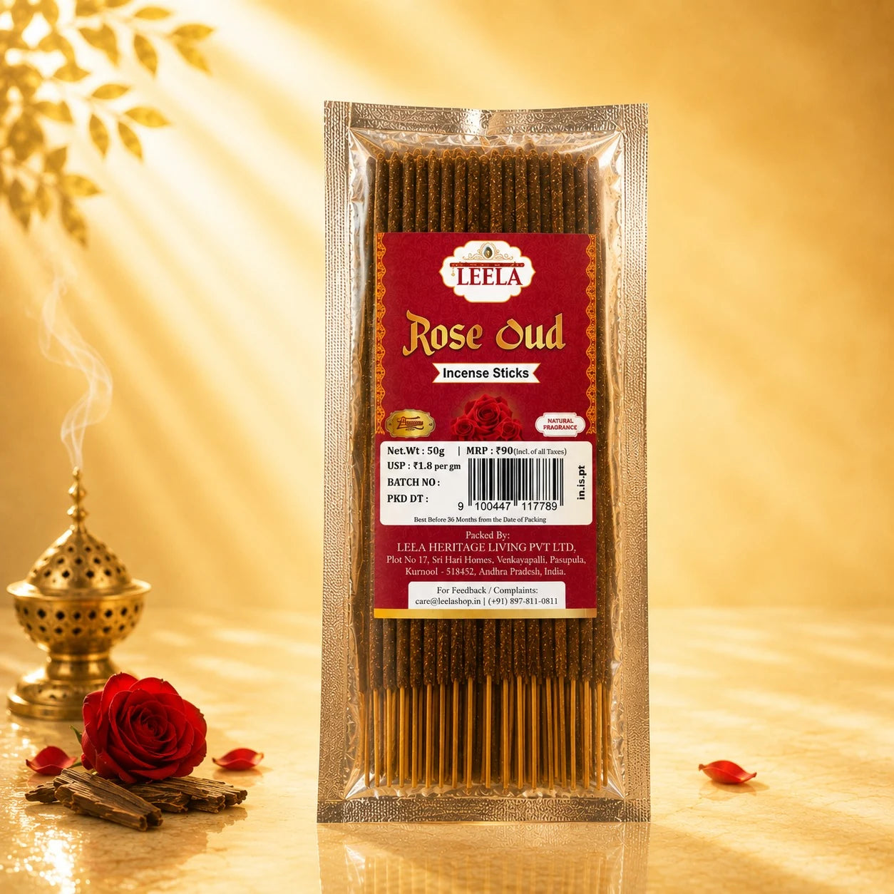 Leela Rose Oud incense sticks with a red rose, oud wood and traditional incense burner