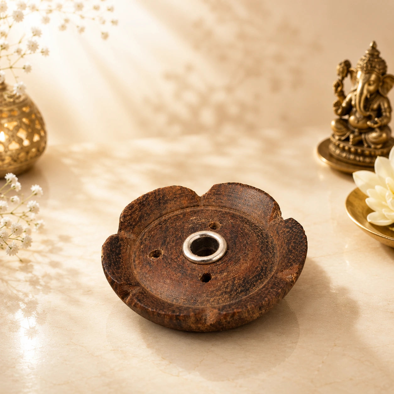 Leela small dark brown flower-shaped wooden incense burner with three ventilation holes and a central metal incense holder.