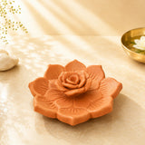 Leela Terracotta clay incense burner shaped like a lotus flower with a detailed rose centerpiece.