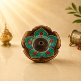 Leela wooden incense burner featuring a lotus-shaped design with turquoise and red inlay, plus multiple incense-stick holes