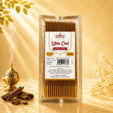 Leela White Oud incense sticks with oud wood and a traditional incense burner